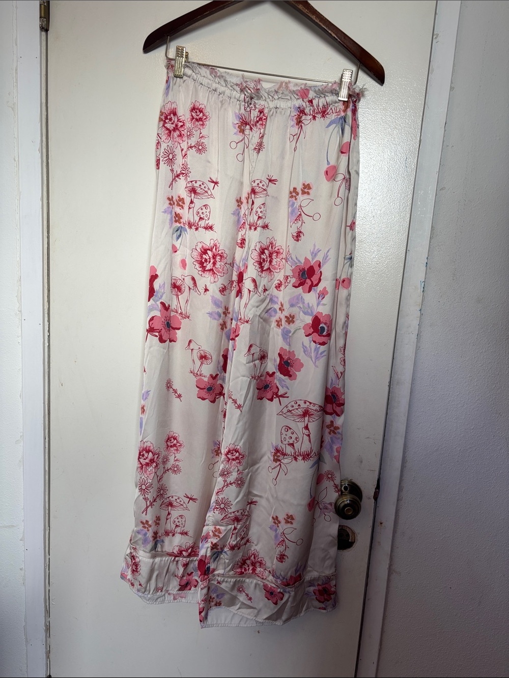 Free People pants with mushrooms and flowers